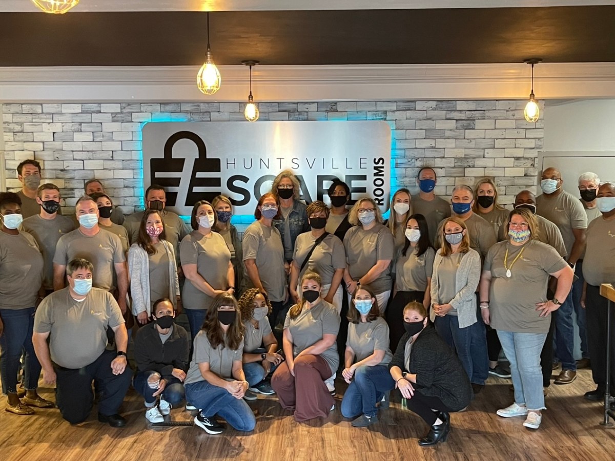 a group of people posing for a photo